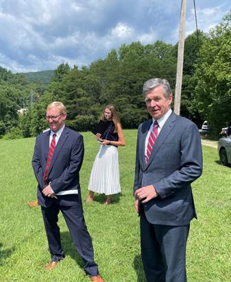 A picture containing grass, outdoor, person, sky
Description automatically generated